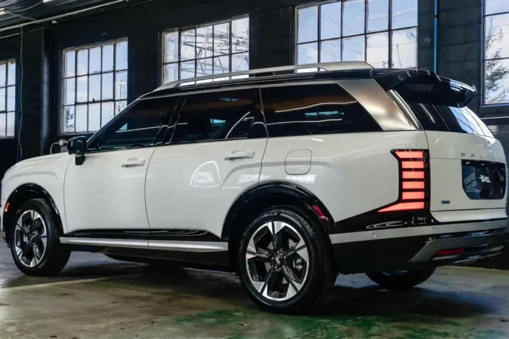 Hyundai Palisade with paint protection film in a detailing shop.