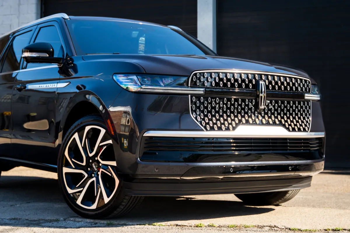 Paint protection film preserving the finish of a Lincoln Navigator.